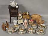a lot of dolls that are sitting on a table