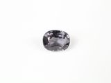 un diamant noir sur fond blanc