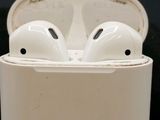 a pair of airpods that are sitting in a case