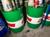 many barrels with different types of gas on them