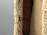 a close up of a fur coat on a mannequin mannequin mannequin mannequin mannequin mannequin mannequin