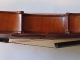 a violin that is sitting on top of a table