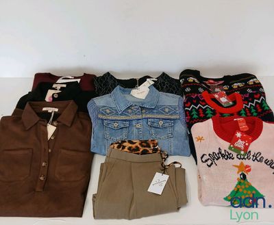 a lot of clothes that are on a table