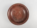 bowl with brown glaze on a white background