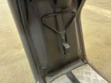 a close up of a metal object on the ground