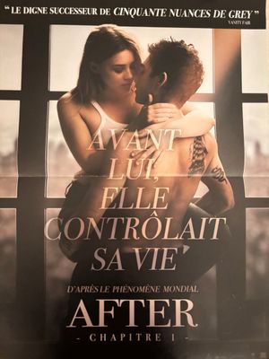 affiche de film représentant un homme et une femme s'embrassant devant une fenêtre