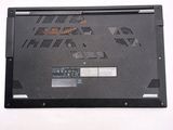 a black laptop with a small fan on top of it