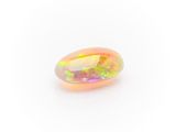 an oval shaped oplite gems with a rainbow hue