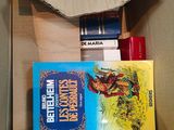 a box with books in it on the floor