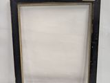 an old black picture frame with a white background and a white background
