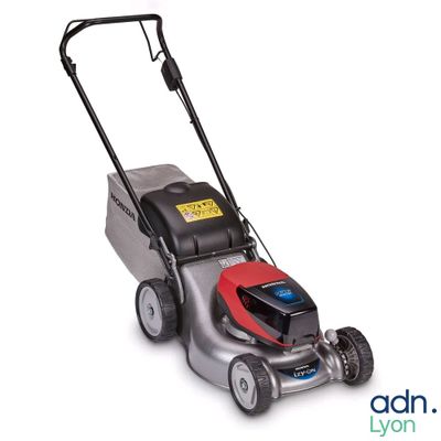 a close up of a lawn mower on a white background