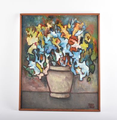 un tableau de fleurs dans un vase sur le mur