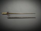 a pair of brass - plated swords, one with a wooden handle and the other with a brass - plated handle
