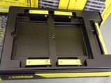a black and yellow box with two yellow boxes in it