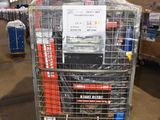 a metal cart with many items in it in a warehouse