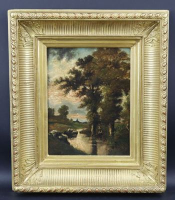 un tableau représentant un paysage avec une rivière et des arbres, dans un cadre doré