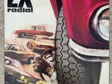 the front cover of a magazine with a picture of a red car