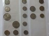 a lot of coins in a plastic bag on a table
