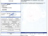 a close up of a document with a picture of a person on it