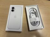 an apple iphone is sitting in a box next to a charger