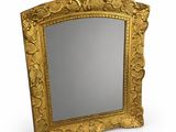 an image of a gold framed mirror on a white background