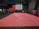 a pink mat in the middle of a gym