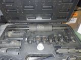 a black case with tools in it sitting on a table