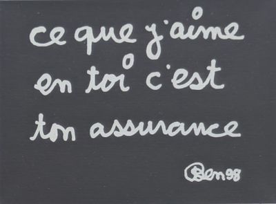 un tableau noir sur lequel est écrite une citation
