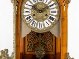 a clock that is sitting on top of a table