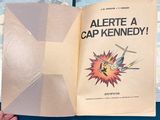 a person holding an open book with a cartoon on it