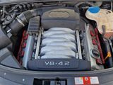 a car engine with the hood open and the hood down