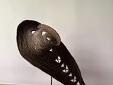 a hat that is on a table in a room
