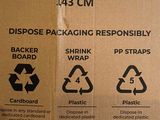 a cardboard box with three different types of recycling bins