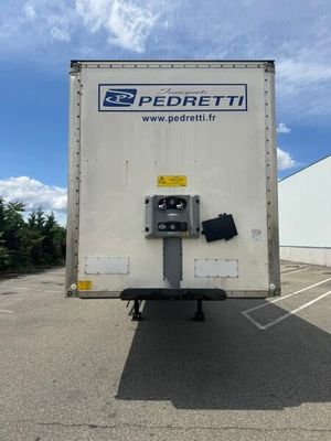 a picture of a delivery truck parked in a parking lot