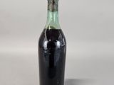 a bottle of soda that is sitting on a table