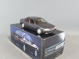 a toy car sitting on top of a box on a table