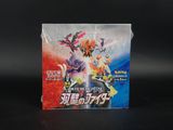 boîte du jeu de cartes Pokémon sur laquelle figure l'image d'un personnage Pokémon