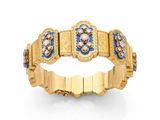 une bague en or 18 carats, émail et diamants