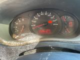 a close up of a car dashboard with a speedometer