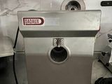 a machine that is sitting on a counter in a kitchen