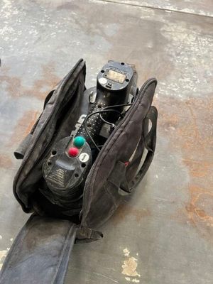 a bag that has a remote control inside of it