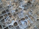a lot of empty wine glasses sitting on a table