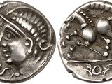 a close up of a silver coin with a horse on it