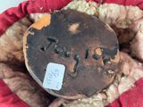 a close up of a piece of bread with a tag on it