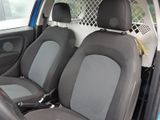 two seats in the back of a small car