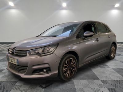 the grey citrole is parked on a checkered floor