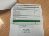 a close up of a receipt on a table