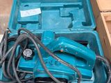 a blue tool box that has a bunch of tools in it