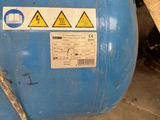 a blue tank that has some signs on it