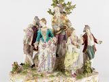 une image représentant une figurine représentant un groupe de personnes avec des instruments de musique